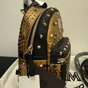 MCM | Bags | Mcm Gold And Black Luxury Backpack | Poshmark display picture 1